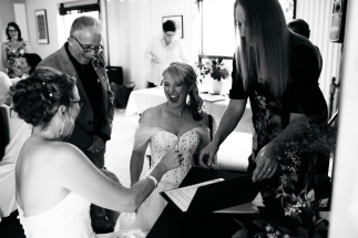 Time to Sign! - photo by Kelly Harwood Photography